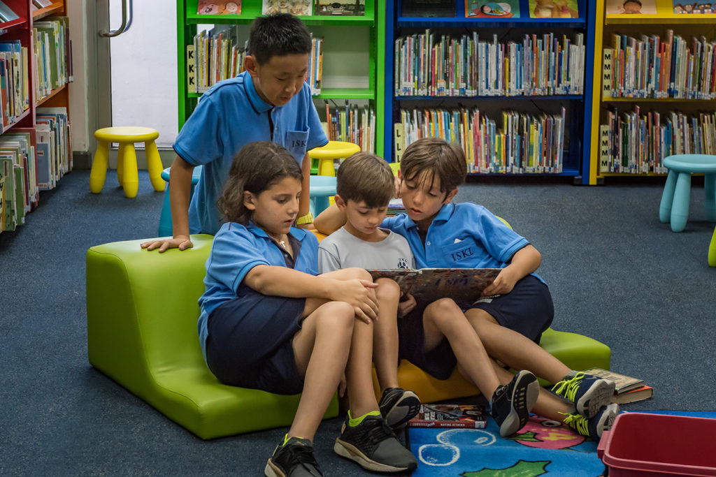 Students reading together