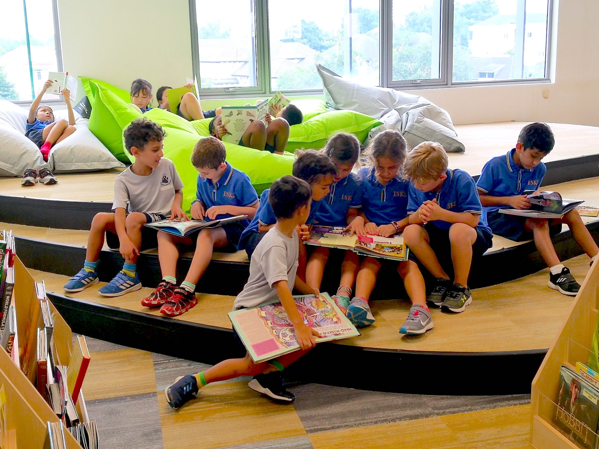 students reading in the library