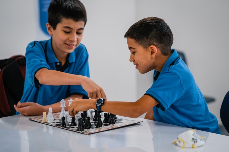 Elementary kids playing chess