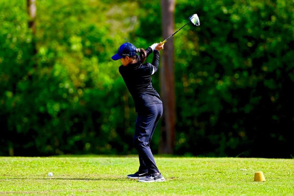Jane practice at the golf course
