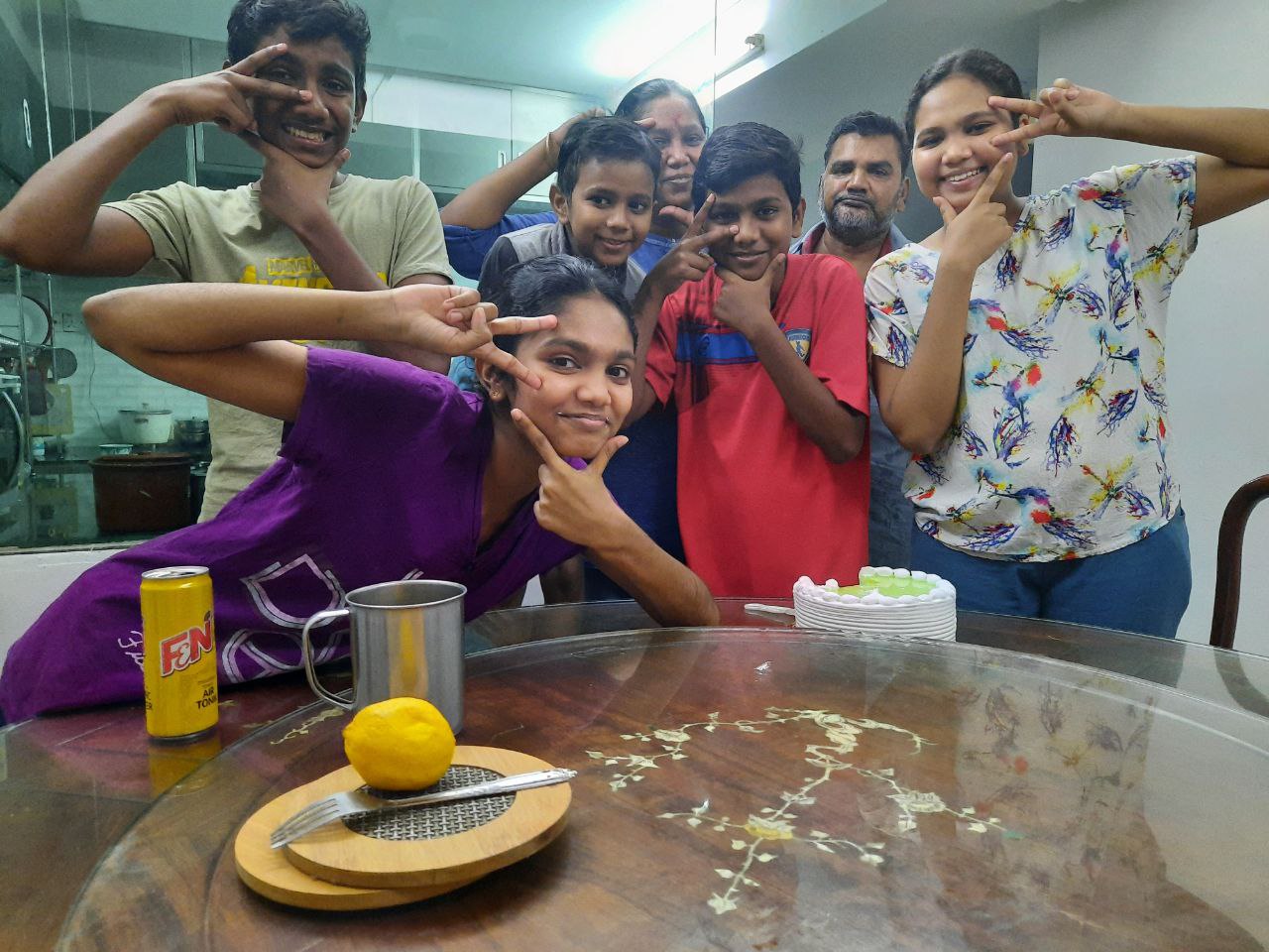 Rhenu A with her family