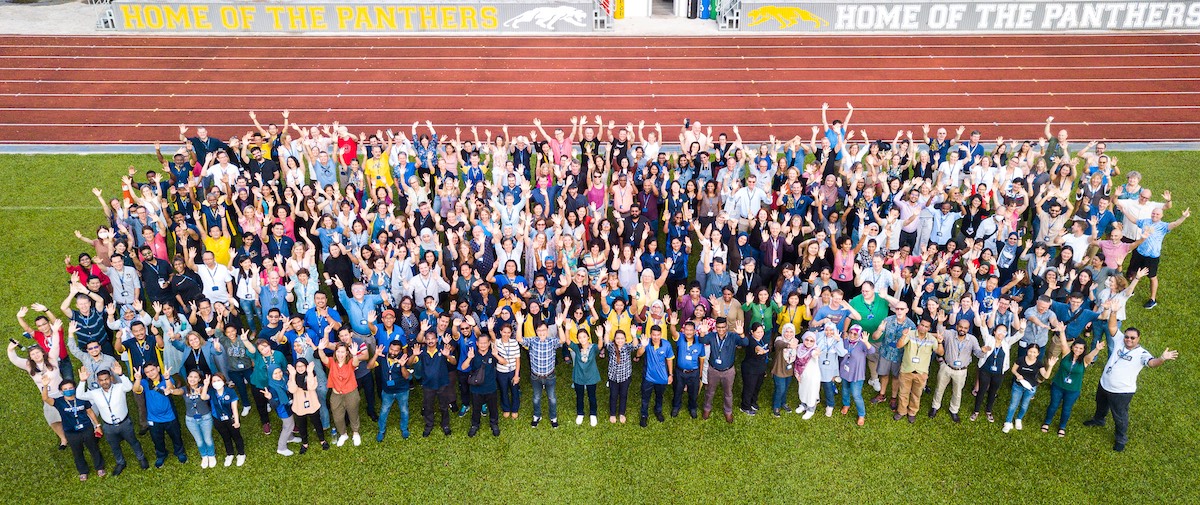 Faculty Staff Field Group Photo
